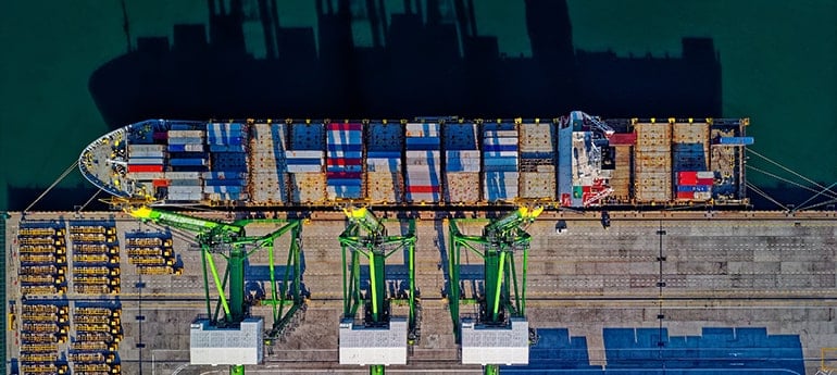Aerial photo of freight containers on a barge